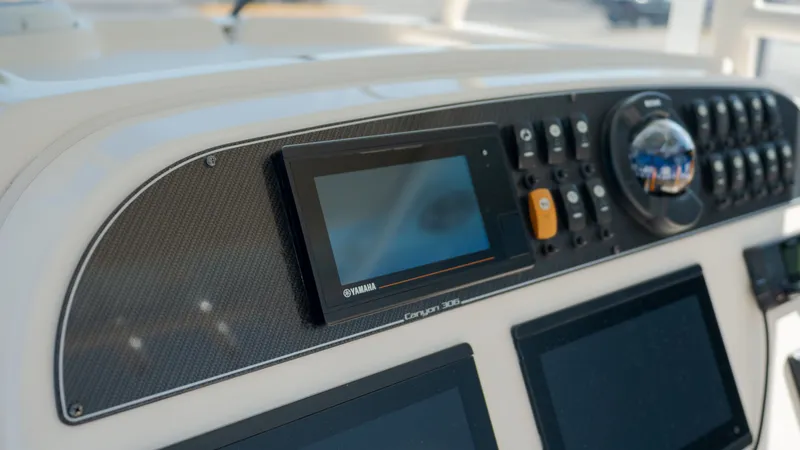 Slide: The Image of Grady-White Canyon 306 2019 boat console with Yamaha controls. - 20