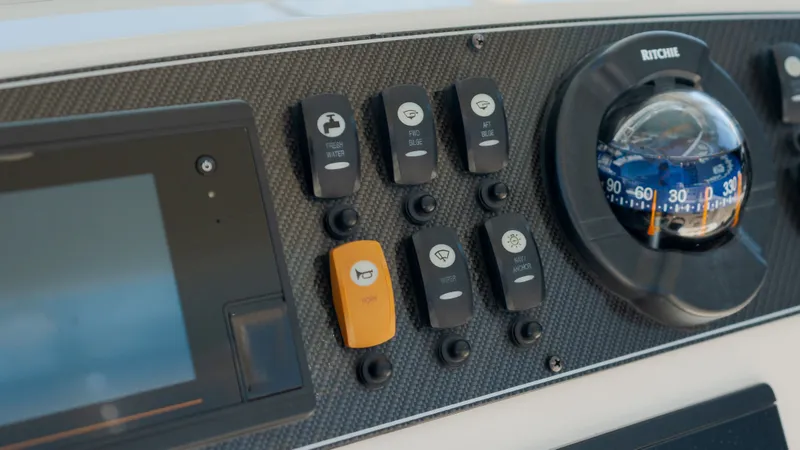 Slide: The Image of Dashboard of 2019 Grady-White Canyon 306 boat. - 21