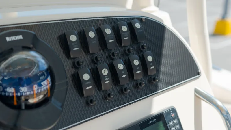Slide: The Image of Dashboard of 2019 Grady-White Canyon 306 boat. - 23