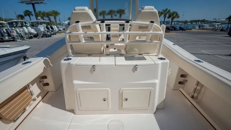 Slide: The Image of 2019 Grady-White Canyon 306 boat rear view at marina. - 32