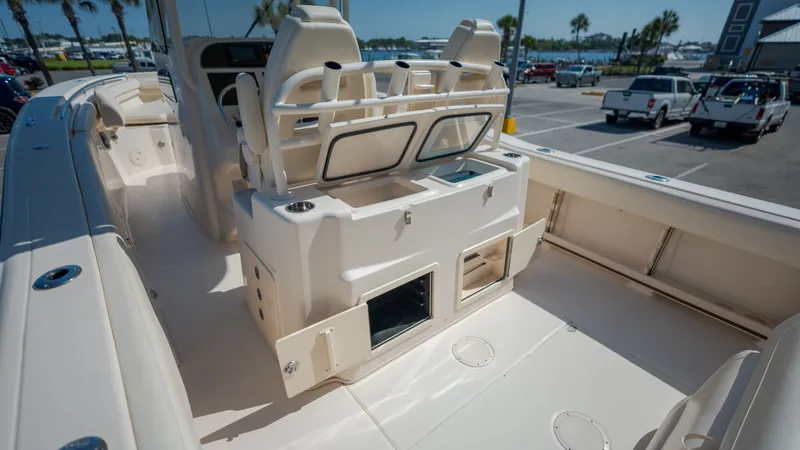 Slide: The Image of Interior view of a 2019 Grady-White Canyon 306 boat at the marina. - 33