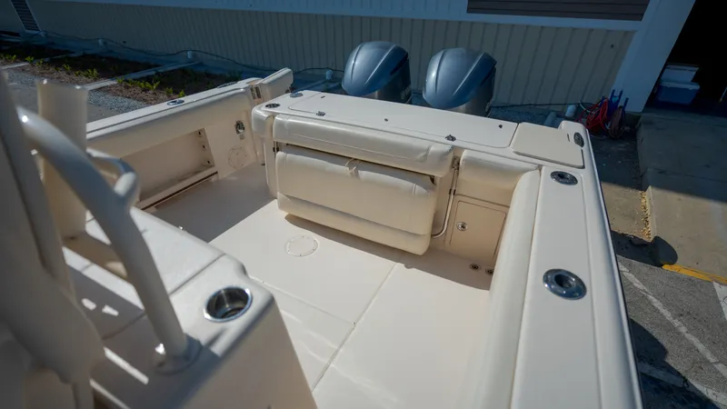 Slide: The Image of 2019 Grady-White Canyon 306 boat rear with engines. - 34