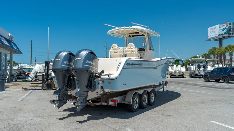 Slide: The Image of 2019 Grady-White Canyon 306 boat with Yamaha engines on trailer. - 5