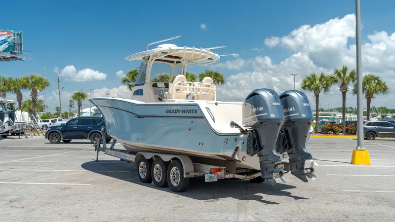 Slide: The Image of 2019 Grady-White Canyon 306 boat parked on trailer outdoors. - 7