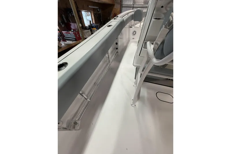 Slide: The Image of 2026 Sportsman Open 232 Center Console interior view, showcasing sleek design and spacious layout. - 27