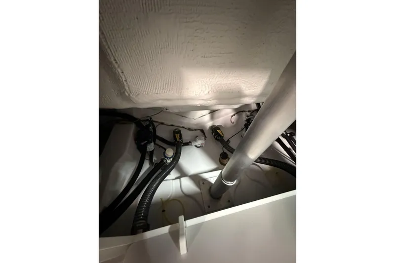 Slide: The Image of 2026 Sportsman Open 232 Center Console interior wiring and components. - 28