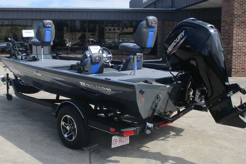 Slide: The Image of 2023 Ranger RT178 boat interior with steering wheel and Lowrance electronics. - 3