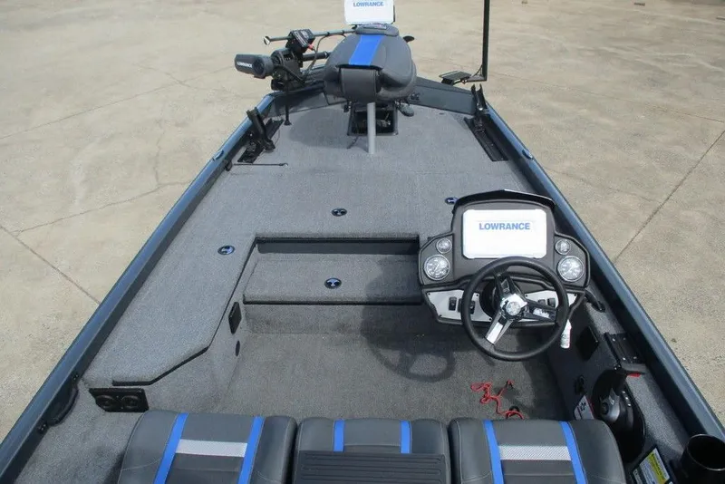 Slide: The Image of 2023 Ranger RT178 boat dashboard with Lowrance display and steering wheel. - 4