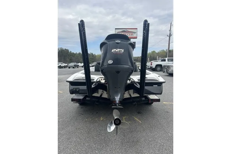 Slide: The Image of 2021 Caymas CX 19 boat rear view with powerful 225 engine on trailer. - 10