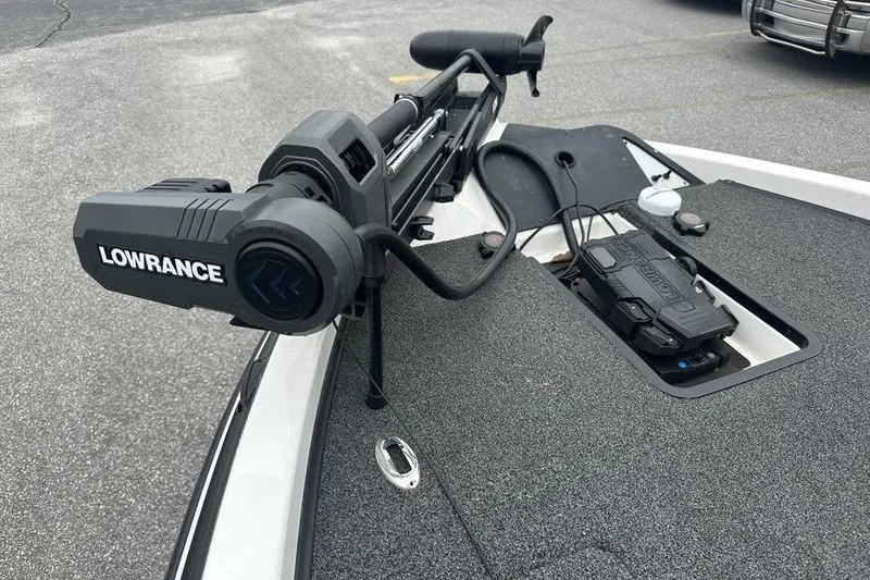 Slide: The Image of 2021 Caymas CX 19 boat with Lowrance trolling motor on deck. - 13