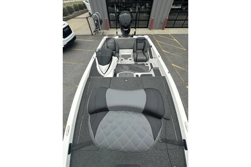 Slide: The Image of 2021 Caymas CX 19 boat interior with gray seating and modern design. - 7