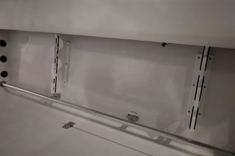 Slide: The Image of Interior view of 2026 Sportsman Open 252 Center Console boat, showcasing mounting brackets. - 21