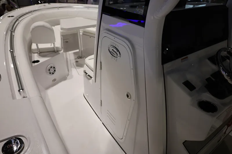 Slide: The Image of 2026 Sportsman Open 252 Center Console boat interior with seating and control panel. - 28