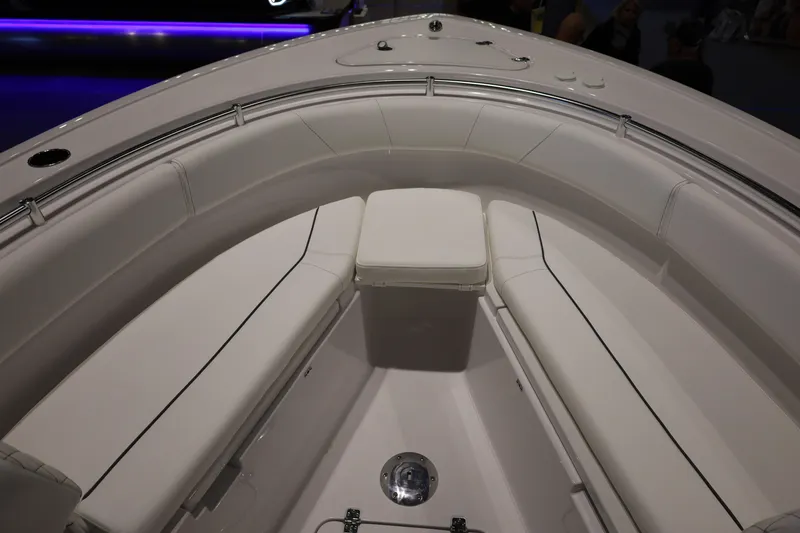 Slide: The Image of 2026 Sportsman Open 252 Center Console boat interior with cushioned seating. - 34