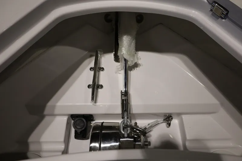 Slide: The Image of Anchor compartment of 2026 Sportsman Open 252 Center Console boat. - 37