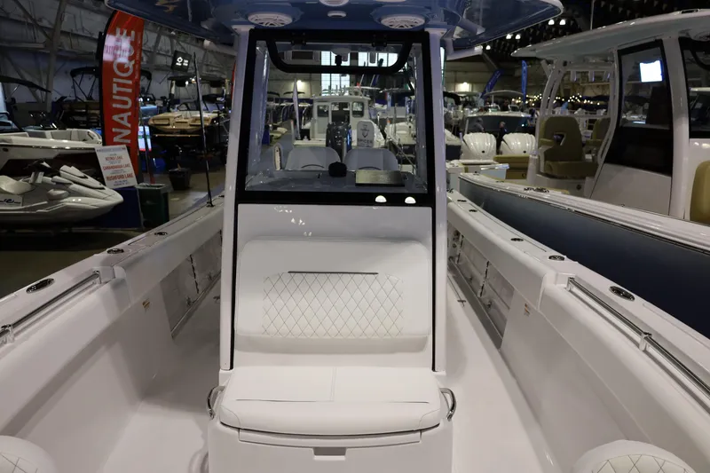 Slide: The Image of 2026 Sportsman Open 252 Center Console boat interior at a boat show. - 38