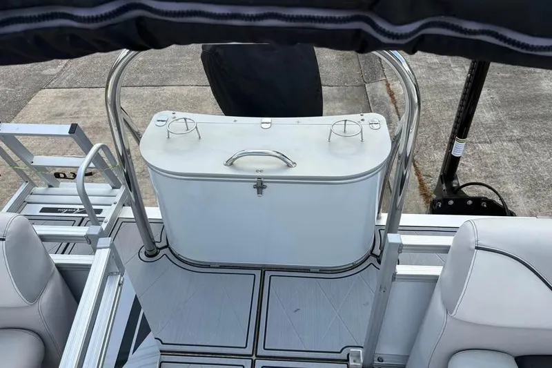 Slide: The Image of 2023 Avalon Venture 85 Quad Lounge interior with seating and storage features. - 3