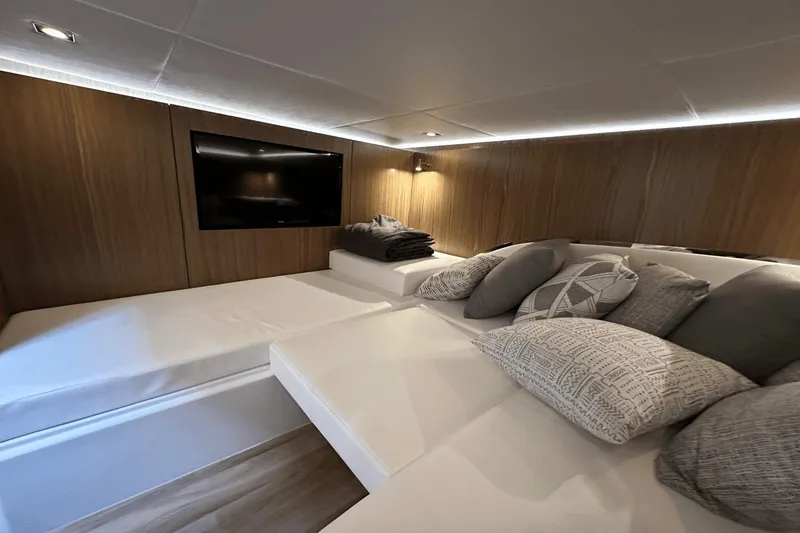 Slide: The Image of Luxurious interior of 2024 Cruisers Yachts 50 GLS with cozy seating and modern decor. - 47