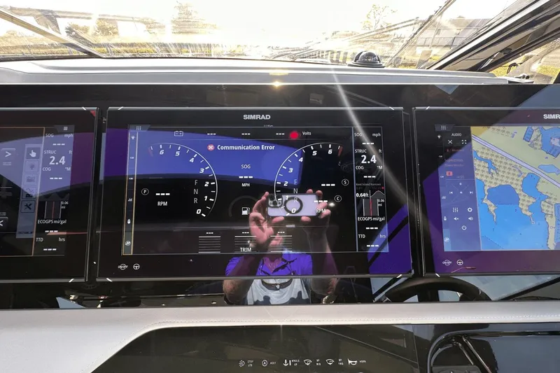 Slide: The Image of Dashboard of 2024 Cruisers Yachts 50 GLS showing navigation and engine data. - 52