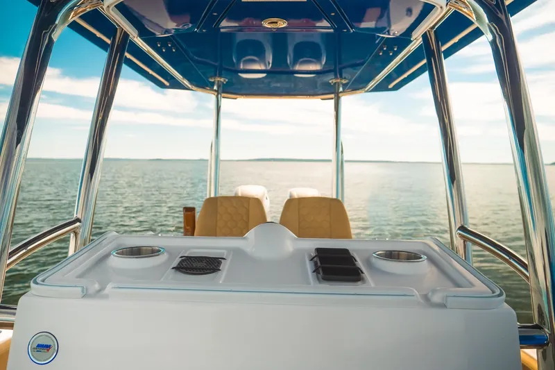 Slide: The Image of 2023 Dynamic D-305V boat interior with ocean view, featuring sleek design and modern amenities. - 17