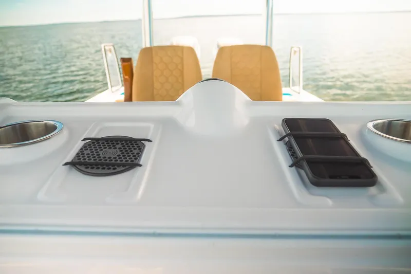 Slide: The Image of Boat console with phone holder and cup holders, Dynamic D-305V, 2023 model. - 18