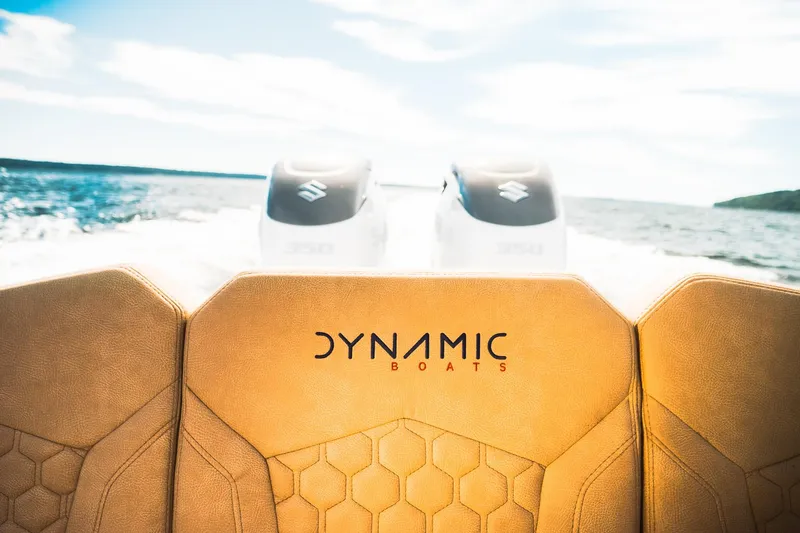Slide: The Image of Luxury Dynamic D-305V boat interior with twin engines on open water, 2023 model. - 27