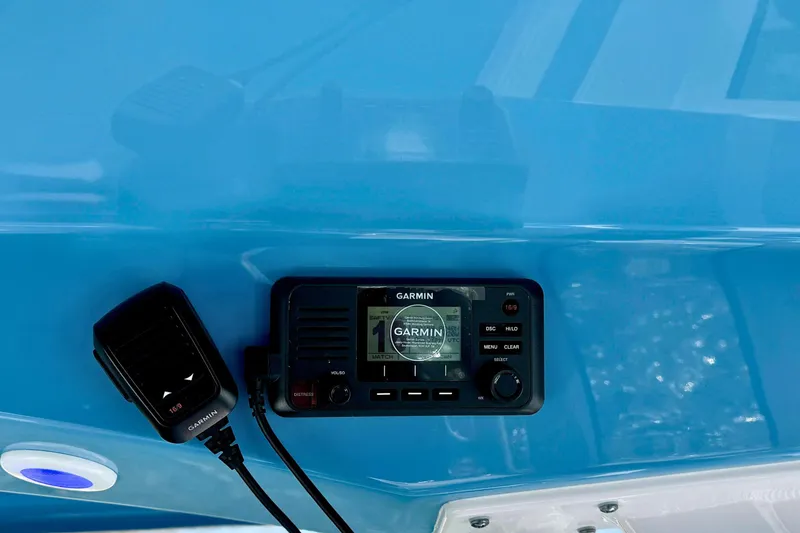 Slide: The Image of 2024 Sportsman Heritage 231 Center Console interior with blue ceiling and window view. - 17