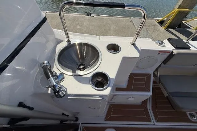 Slide: The Image of Outdoor sink and faucet on a 2019 Cutwater 28 boat deck. - 20
