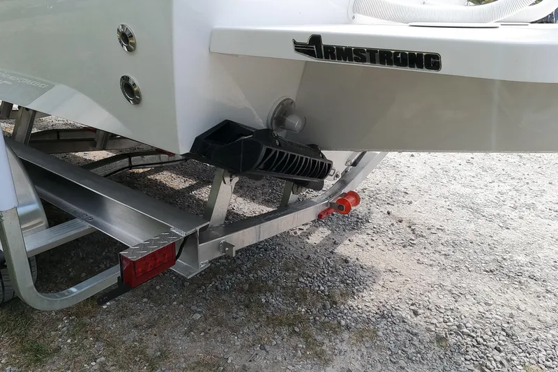 Slide: The Image of 2026 Bluewater Sportfishing 25T boat on trailer, rear view with Armstrong bracket. - 7
