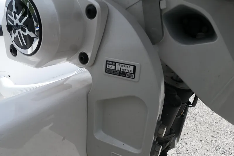 Slide: The Image of Close-up of Yamaha motor on 2026 Bluewater Sportfishing 25T boat, showing model details. - 9