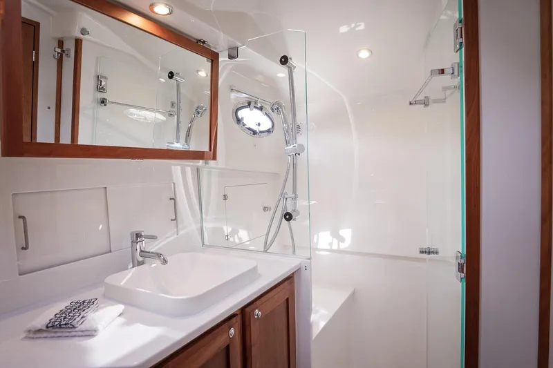 Slide: The Image of Luxurious bathroom in 2023 Back Cove 39O yacht with modern fixtures and elegant design. - 14