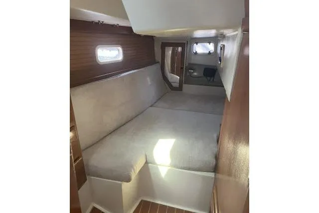 Slide: The Image of Galley stove in 1993 Catalina 36 MkII sailboat with wooden cover and stainless steel finish. - 13