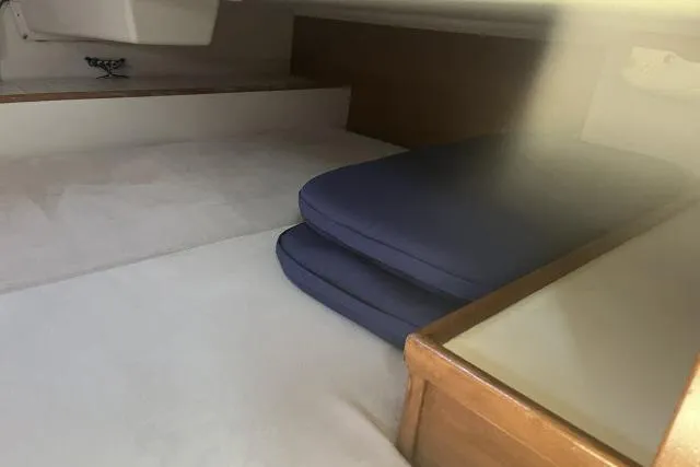 Slide: The Image of Built-in fridge with drinks inside a 1993 Catalina 36 MkII sailboat. - 14