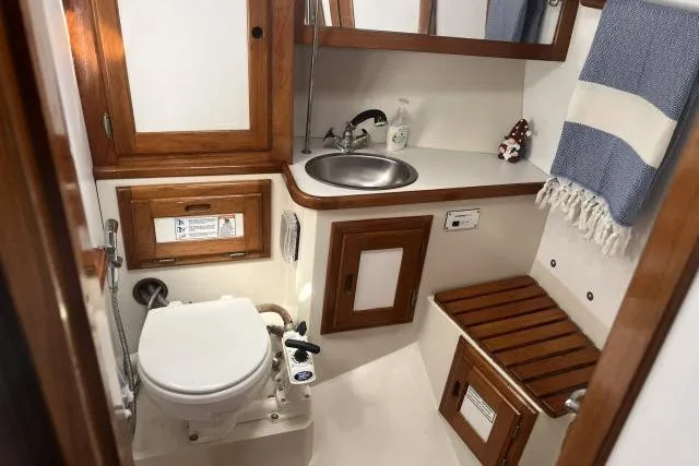 Slide: The Image of Interior cabin of a 1993 Catalina 36 MkII sailboat with cozy sleeping area. - 16