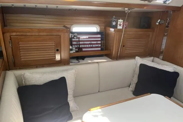 Slide: The Image of Interior of 1993 Catalina 36 MkII sailboat with cozy seating and dining area. - 3