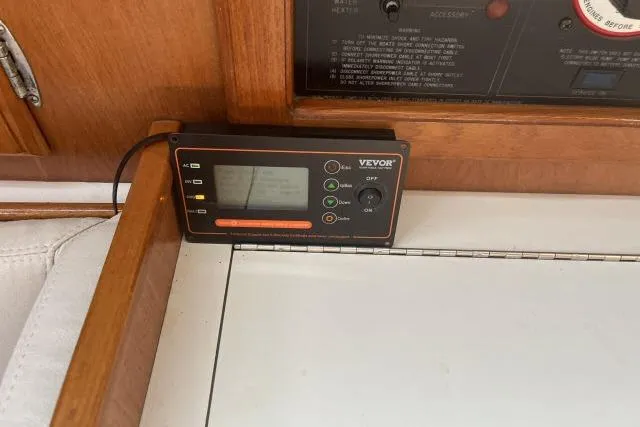 Slide: The Image of Interior of a 1993 Catalina 36 MkII sailboat with navigation station and seating area. - 7