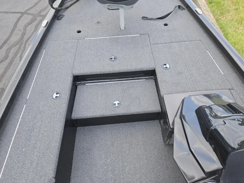 Slide: The Image of 2022 Vexus AVX181 boat deck with storage compartments and sleek design. - 15