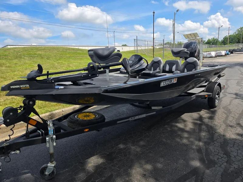 Slide: The Image of 2022 Vexus AVX181 boat on trailer, featuring Minn Kota Maxxum trolling motor. - 6