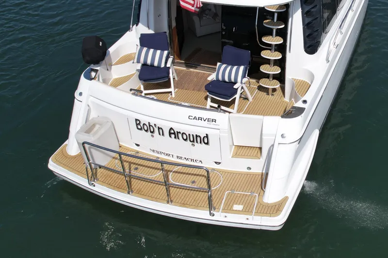 Slide: The Image of 2000 Carver 53 Voyager yacht with deck chairs, Newport Beach. - 10
