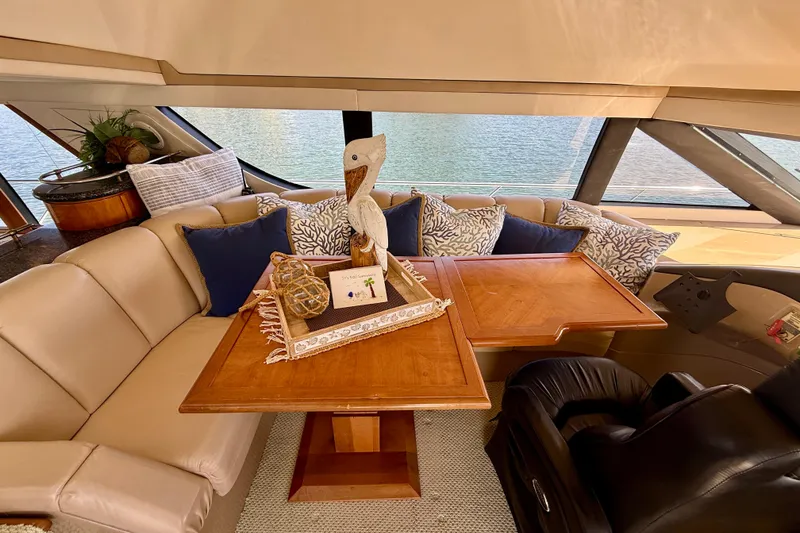 Slide: The Image of Luxurious interior of 2000 Carver 53 Voyager yacht with elegant seating and decor. - 71