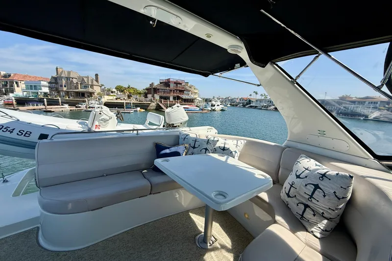Slide: The Image of Luxurious 2000 Carver 53 Voyager yacht interior with waterfront view and comfortable seating. - 73
