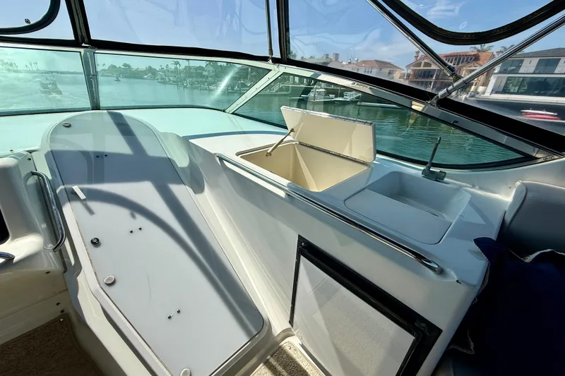 Slide: The Image of Interior view of 2000 Carver 53 Voyager yacht with sink and storage compartments. - 78