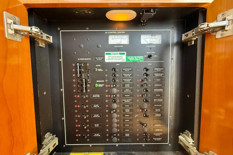 Slide: The Image of Electrical control panel inside a 2000 Carver 53 Voyager yacht. - 89