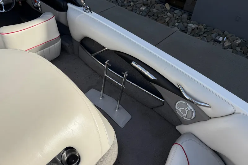 Slide: The Image of 2009 Malibu Response LXi interior with white leather seats and sleek design elements. - 12