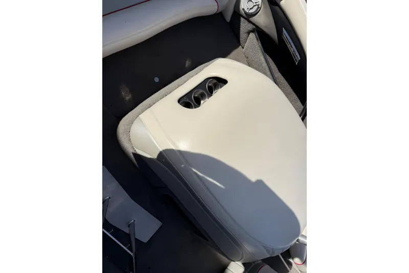 Slide: The Image of 2009 Malibu Response LXi interior with beige upholstery and cup holders. - 19