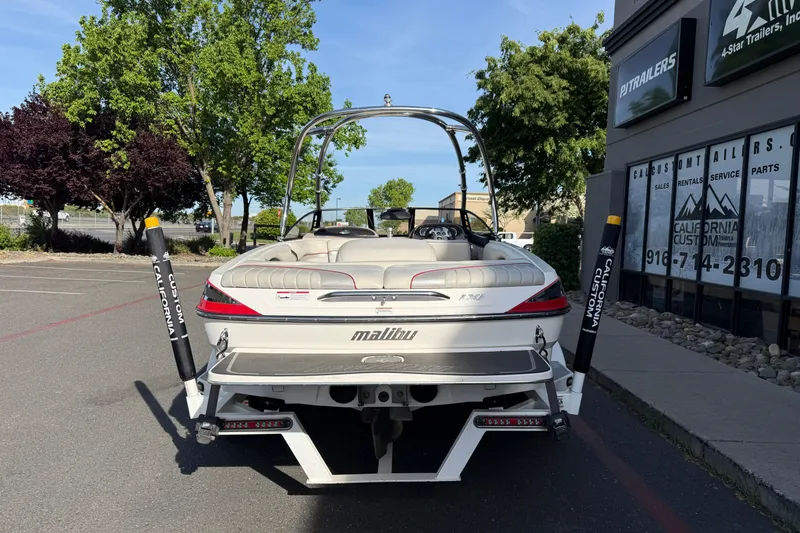 Slide: The Image of 2009 Malibu Response LXi boat parked near California Custom Trailers shop. - 3
