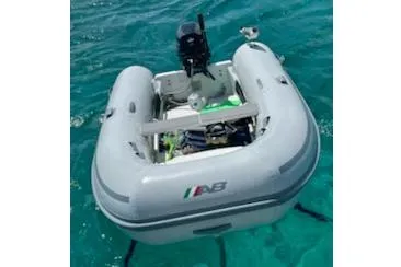 Slide: The Image of Inflatable dinghy on clear water, associated with 2005 Beneteau Oceanis Clipper 423 yacht. - 18