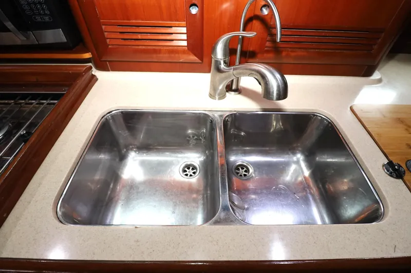 Slide: The Image of Double stainless steel sink in 2005 Beneteau Oceanis Clipper 423 yacht kitchen. - 6