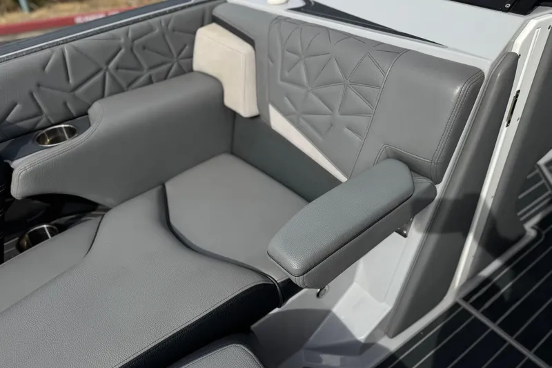 Slide: The Image of Luxurious seating in 2022 Nautique Super Air Nautique G25 Paragon boat interior. - 17