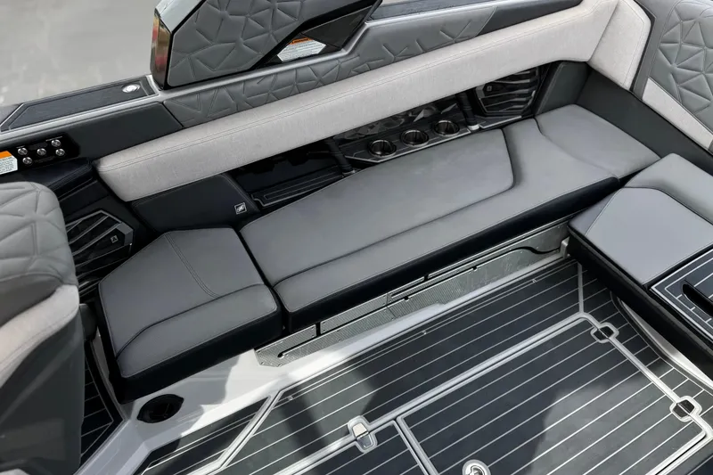 Slide: The Image of 2022 Nautique Super Air Nautique G25 Paragon interior seating with quilted upholstery. - 32